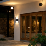 Outdoor wall lamp on exterior wall with warm beam effect