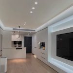 Ceiling downlights installed in a modern living room with false ceiling design