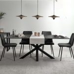 Astrid gun metal pendant lamp dining table lighting with three pendant lights above black dining table
