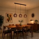 Mid century pendant light with three Copper Latte shades over wooden dining table