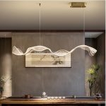 Wave Gold dining room pendant light fixtures above dining table