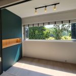 Gold track light installed in Singapore HDB entrance walkway