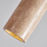 Close up detail of yellow travertine stone texture on wabi sabi pendant light