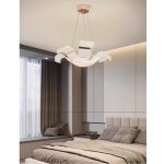 Wave Rose Gold 3 Tier hanging dining room lights installed in modern bedroom with starry glitter acrylic