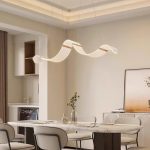 Wave Rose Gold modern hanging light fixtures above dining table in Singapore home interior