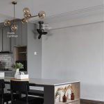 Acorn DC360 black corner fan installed at kitchen dining corner in a Singapore home