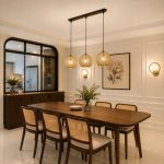 Mid century gold pendant light above Singapore HDB dining table