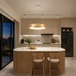 light wood ring pendant light above kitchen island